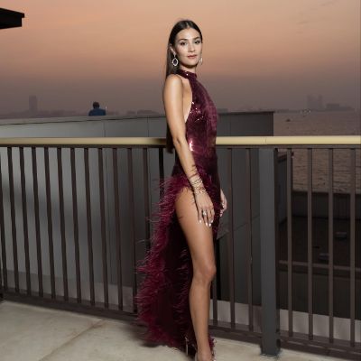Anastasia Shubskaya, wearing a stunning red dress in Dubai.